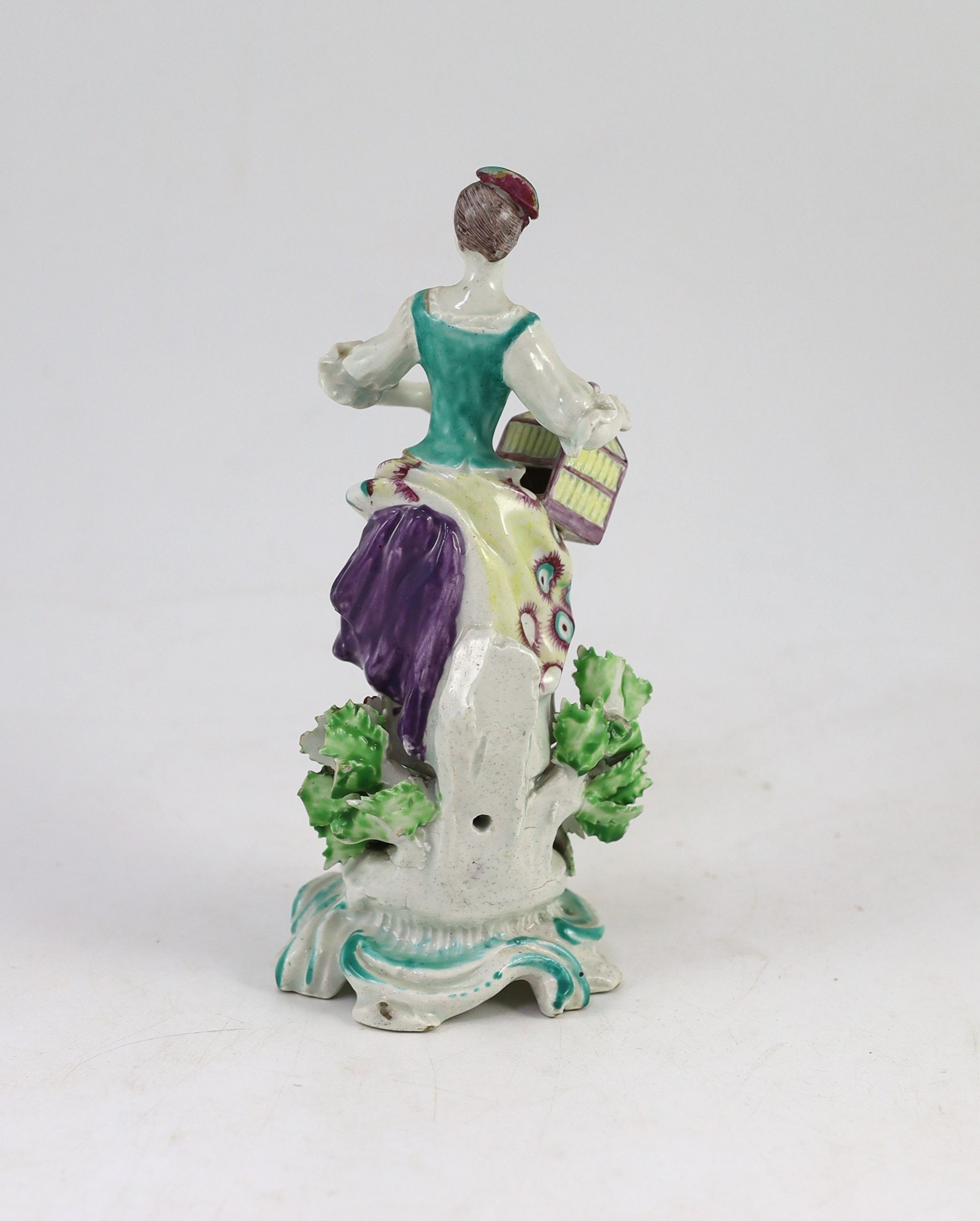 A Bow porcelain figure of a lady, emblematic of Matrimony, c.1765, 20.5cm high